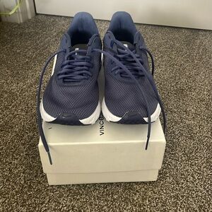 Nike Revolution sneakers, size 9 1/2, good condition.